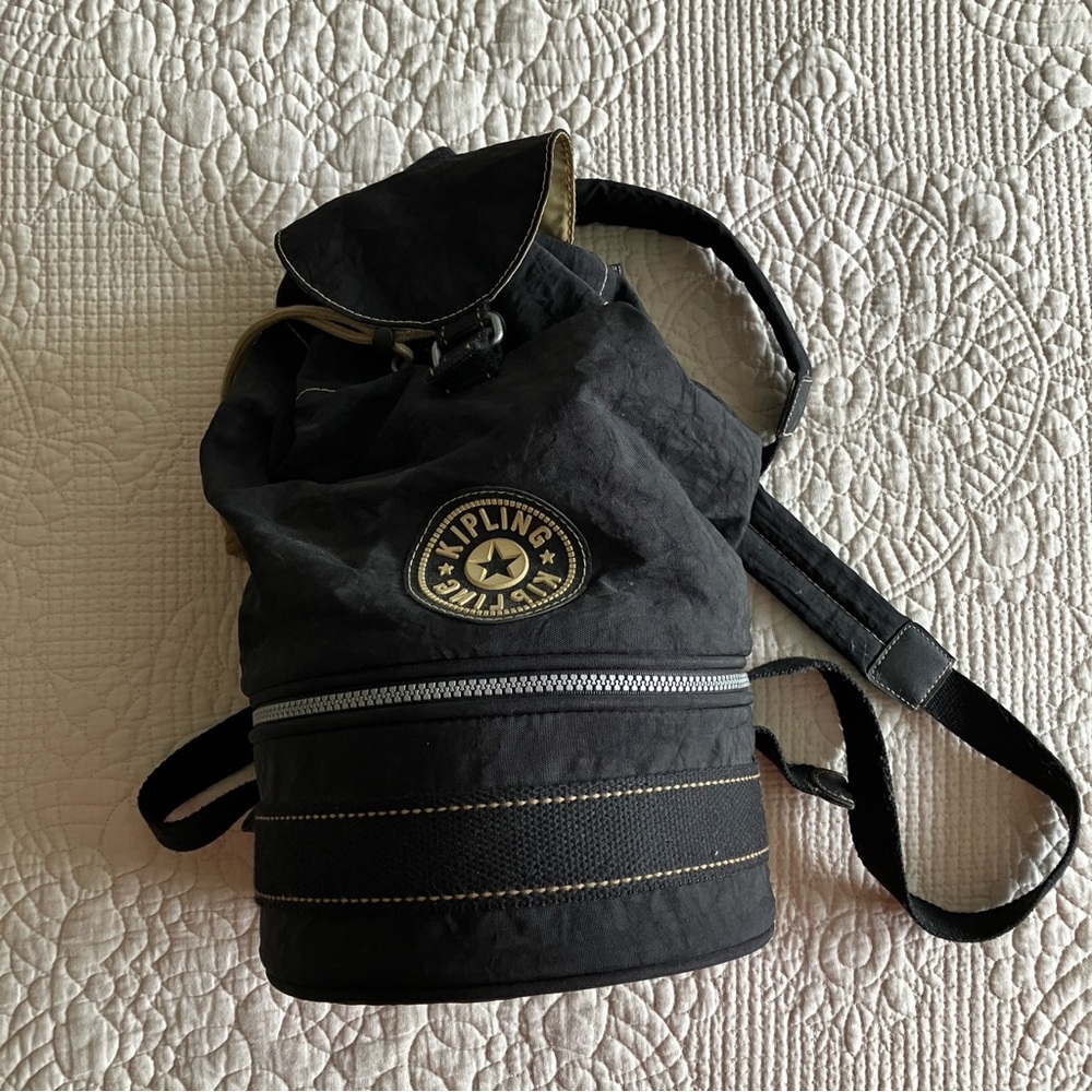 Kipling black camera & lens bag/ backpack.